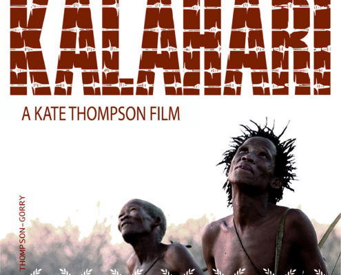 Poster for the film "Chaos in the Kalahari" by Kate Thompson. The background shows two indigenous people, one looking up, holding a spear in a desert landscape. The title appears in bold letters at the top. Various film festival awards are displayed at the bottom.